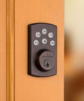 Keyless Entry Deadbolt Electronic Door Lock With 6 Button Keypad Illuminated Night Entry No Hassle Auto Locking And Keyed Pick Resistant SmartKey Rekey Security Technology Venetian Bronze Finish on a wooden door
