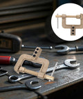 Heavy Duty Ground Clamp For Welders With High Current Transfer And Thickened Copper Contact Design To Stop Rust And Ensure Reliable Sturdy Spring Operation For Tough Home Shop Or Field Jobs That Need Real Muscle on a workbench with tools.
