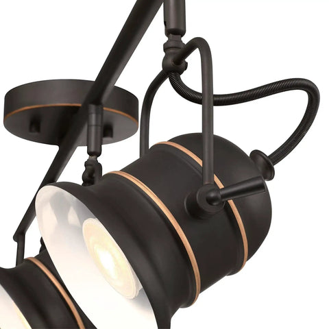 Close-up of Boswell Vintage-Style Four-Light Indoor Track Light Kit in oil rubbed bronze with metal shades and highlights.