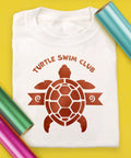 Premium Electric Copper EasyWeed Heat Transfer Vinyl Roll, 11.8 By 3 Feet, used on a 'Turtle Swim Club' t-shirt.
