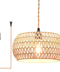 Real Deal Plug In Pendant Light Featuring Woven Rattan Shade And Hassle Free On Off Switch showing warm illumination and cord switch.