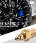 Close-up of Knockout Copper Brake Bleeder Screw Kit with 1/4-28 threads and 1/8 NPT bases on car brake disc.