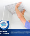 Person installing 20 By 25 By 1 Inch Air Filter MERV 13 4 Pack Electrostatic Pleated Replacement for HVAC System Made in USA