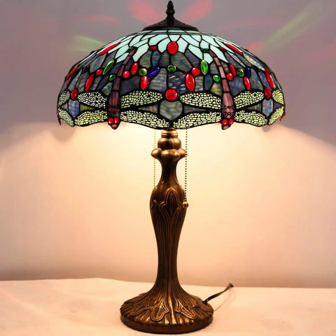 Sea Blue Dragonfly Style Stained Glass Lamp Shade Replacement 16x8 Inch with cap, warm glow on brass table lamp, artistic design.