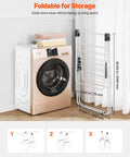 Heavy Duty Two Tier Clothes Drying Rack With 31 Sturdy Rods And Sock Clips Foldable Metal Laundry Stand next to a washing machine.