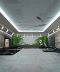 Arcfox 15W 4000K LED H Type Track Lighting Heads illuminating a modern gallery space with stone walls and greenery, CRI90.