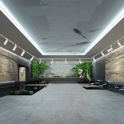 Arcfox 15W 4000K LED H Type Track Lighting Heads illuminating a modern gallery space with stone walls and greenery, CRI90.