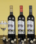 60 Piece Wine Bottle Sealer Kit With Cork Stoppers And PVC Heat Shrink Capsules In Black Red Gold displayed with wine bottles.