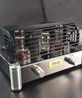 A12 EL34 12AX7 ECC83 Tube Amplifier for HiFi Stereo on black surface, showing vintage warmth and rich dynamics with tube cage.