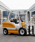 Compact Electric Pallet Stacker Mini Forklift For Warehouse Material Handling And Small Retail Spaces Easy Portable Lift For Tight Aisles in warehouse with pallets.
