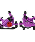 Top Shelf Mechanical Disc Brake Pair Aluminum Alloy Build For Mountain And Road Bikes Beast Mode Stopping Power Plug And Play Setup Killer Look In Violet Finish Smooth Ride Every Time. Close-up view of purple mechanical disc brake calipers.