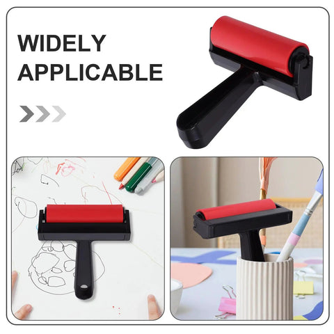 Solid Grip Rubber Paint Roller For Printmaking And Classroom Art Projects on a drawing table with art supplies.