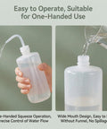 Set Of Two 34 Oz Plastic Wash Bottles Serving Up A Real Deal Squeeze Experience For Tattoo Pros And Lab Techs Featuring visible measuring scale and one-handed squeeze operation.