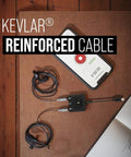 SmartLav Plus Lavalier Microphone for Smartphones and Tablets With Clip-On Mount and Foam Pop Shield on wooden desk