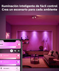 Hue LightStrip Plus Dimmable LED Smart Light Extension in living room with purple ambient lighting, smartphone app control, furniture setup visible.