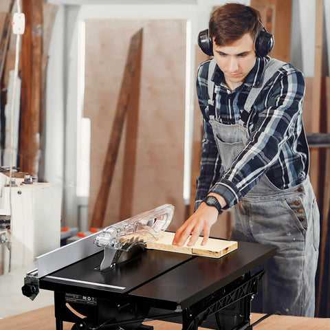 Person using a Compact Jobsite Table Saw With An 8 Inch 24 Tooth Blade Driven By A 6.7 Amp Pure Copper Motor Spinning 3576 Rpm.