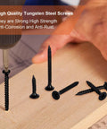 Pro Grade Drywall Screws Set With 190 Pcs Black Steel Self Tapping Phillips Screws shown on wood with screwdriver