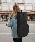 Portable Drum Pouch With Waterproof Mallet Storage For Percussion Gear And Snare Drum Essentials Hella Tough Oxford Fabric Bag worn by a woman.