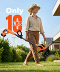 Person carrying Cordless Garden Tiller Cultivator With 21V Battery Lightweight Rototiller For Easy Weeding in a garden setting.