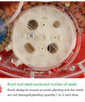Close-up of clear hopper in Manual Seed Seeder Handheld For Garden And Farm Use, 20cm Spacing for precise seed sowing.