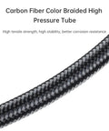 Close-up of heavy duty braided high pressure scuba regulator hose, carbon fiber look, showing strength and stability.
