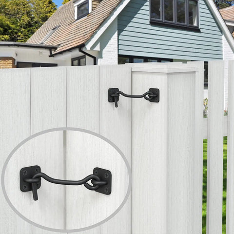Heavy Duty Wrought Iron Barn Door Latch And Lock With Hand Forged Eye And Hook Black Powder Coat Finish on white gate