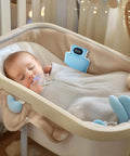 Sleeping baby with Ultimate Baby Sleep Soother With Three Adjustable Vibration Modes And 90 Minute Timer For Newborns in crib