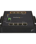 Rock Solid Eight Port Gigabit PoE Switch With Four Powered Ports And One Twenty Watt Budget view showing black steel housing and port layout.