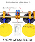 Stone seam setter with two 6-inch vacuum suction cups on stainless steel rods; yellow hand pumps and protective covers.