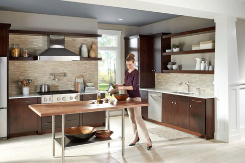 Modern kitchen with refillable kitchen soap dispenser with above sink bottle in spot resist stainless finish, deck mounted.