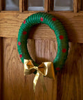 Wreath made from Green Duct Tape 1.88 In By 20 Yd Heavy Duty Colored Tape For Repairs And Crafts hanging on wooden door
