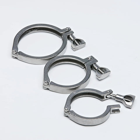Three 2-inch stainless steel tri-clamps with silicone gaskets and threaded ferrule fittings