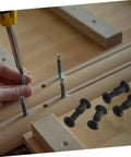 Bulk 170 Piece Steel Furniture Hardware Kit Rock Solid Screws And Nuts for bed frame assembly with black bolts in use.