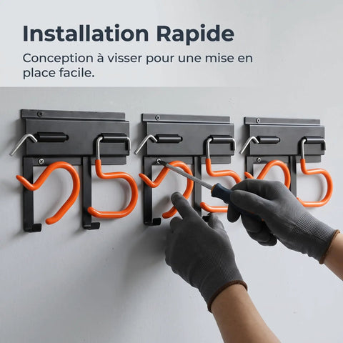 Installation of Heavy Duty Metal Wall Mount Tool Organizer Rack for Garden Tools with sturdy orange hooks.