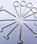 Top Shelf Emergency Key Kit For Interior Door Locks With Kwikset Schlage Includes Twelve Heavy Duty Brass Tools arranged in a circle.