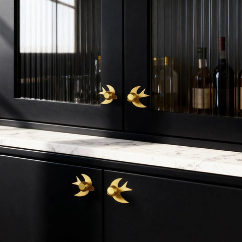 Solid Brass Gold Cabinet Knobs 4 Pack With Swallow Backplates on modern kitchen cabinets, brushed brass finish, installed view