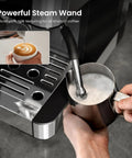 Ditch The Daily Coffee Run With This Pro Home Espresso Maker Featuring A Built In Grinder And Adjustable Milk Frother 15 Bar Extraction Pump Plus Instant Hot Water For Smooth Daily Lattes showing steam wand frothing milk.