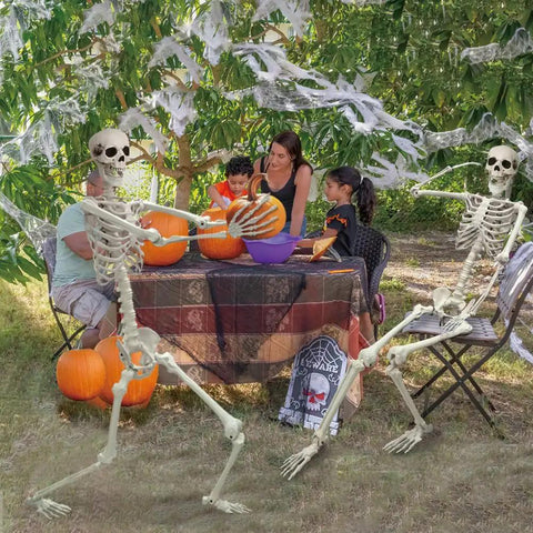 5.9-Foot Life-Size Poseable Skeleton for Halloween Decor with family pumpkin carving in garden