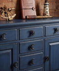 Six Piece Set Black Cast Iron Drawer Pulls And Cabinet Knobs With Crescent Moon Face Design Hand Painted In Rich Black Finish Adds Mid Century Modern Charm And Elegant Burst Style Includes Screws on blue dresser