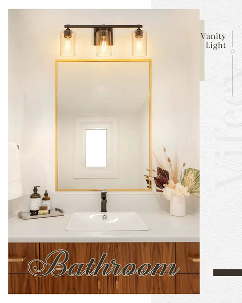 Three Light Vanity Lights With Dope Oil Rubbed Bronze Finish And Clear Glass Shades above bathroom mirror