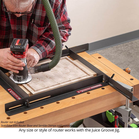 Juice Groove Router Jig For Cutting Boards, Adjustable Rails That Create Clean Juice Grooves On Boards From Ten And One Quarter Inch To Eighteen And Three Quarters Inch, Powder Coated Steel Rail Design, No Fuss Setup, Made In USA, shown in use on a wooden board with a router.
