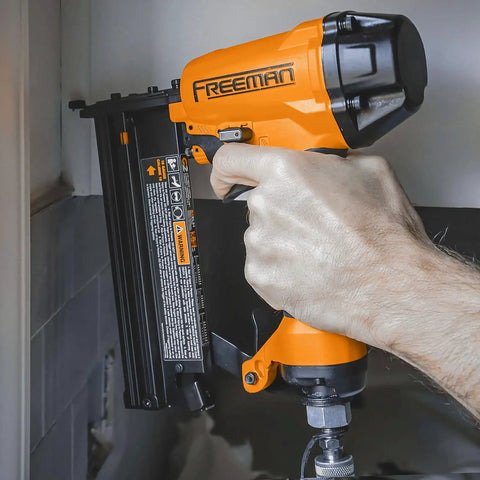 Close-up of G2XL31 Second Gen Pneumatic 3 In 1 Finish Nailer And Stapler For 16 And 18 Gauge being used on wood surface