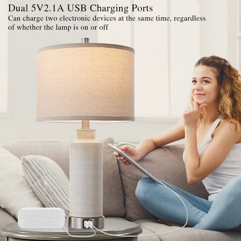 Set of 2 Modern Touch Table Lamps for Living Room and Bedroom with USB ports, white ceramic base, charging tablet on couch.