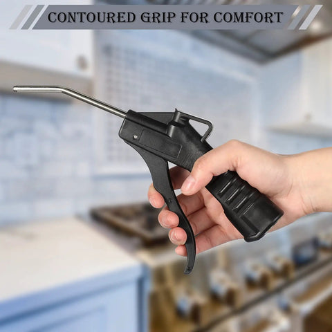 Hand holding 8 Piece Air Blower Nozzle Set With Pistol Grip For Compressor, black handle, contoured grip for comfort, in kitchen setting.