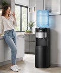 Top Loading Water Cooler Dispenser With Three Temperature Settings, 3L Cold Tank And 1L Hot Tank in a modern kitchen