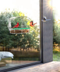 Clear Acrylic Window Bird Feeder With 4 Strong Suction Cups And Detachable Seed Tray Highly Transparent Outdoor Viewing Birdfeeder mounted on a window with birds feeding.