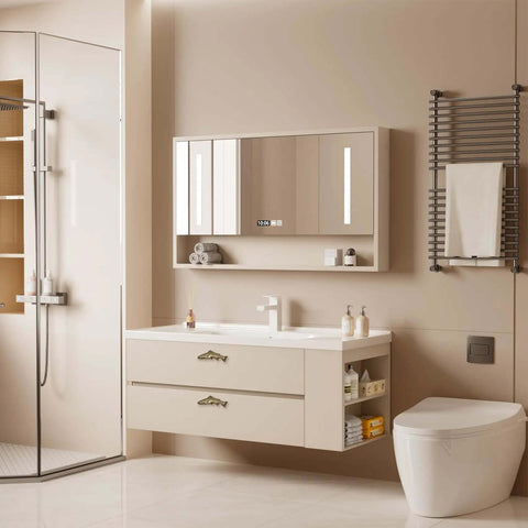 Modern bathroom with beige floating vanity, mirror, and white fixtures, showcasing details of the space.
