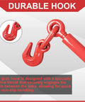 Close-up of heavy duty ratchet load binder with grab hook on red forged steel tie down system for cargo flatbed trailers