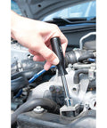 Hand using 7 Piece SAE Nut Driver Set With Chrome Plated Alloy Shafts Comfortable Grips And A Handy Storage Case For Easy Tightening