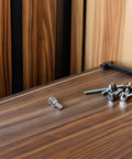 Solid 108 Piece Stainless Steel Screw Kit With Matching Nuts And Washers Perfect For Hacking Electronics And Serious Industrial Assembly Work Without The Hassle on wooden table.